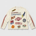 Cream racing top with colored patches and printed sleeves