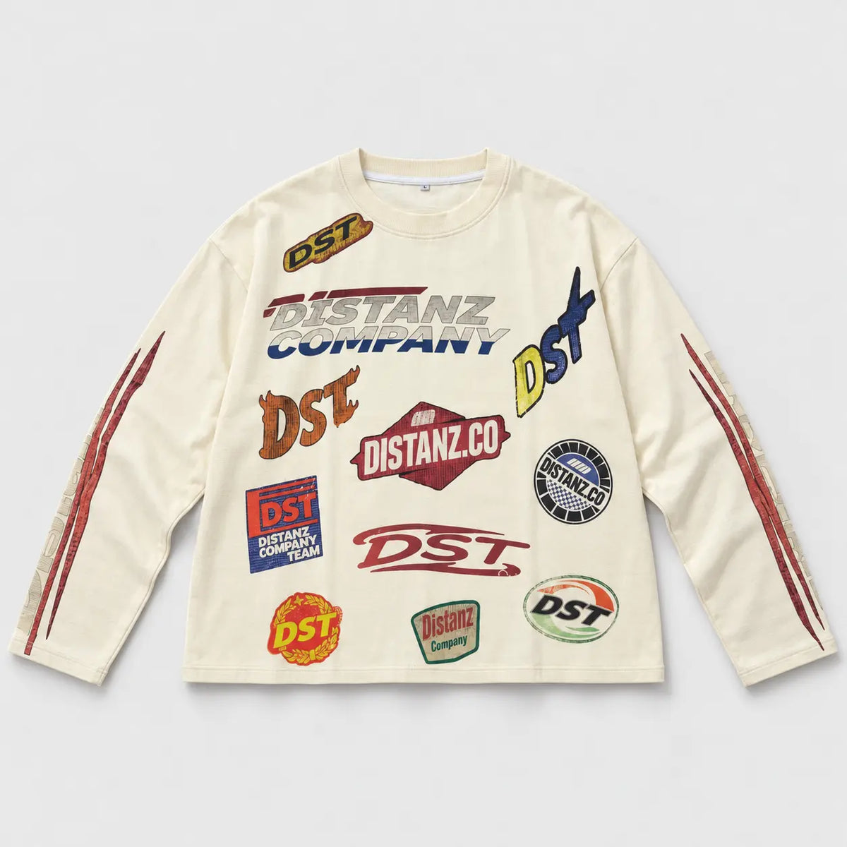 Cream racing top with colored patches and printed sleeves